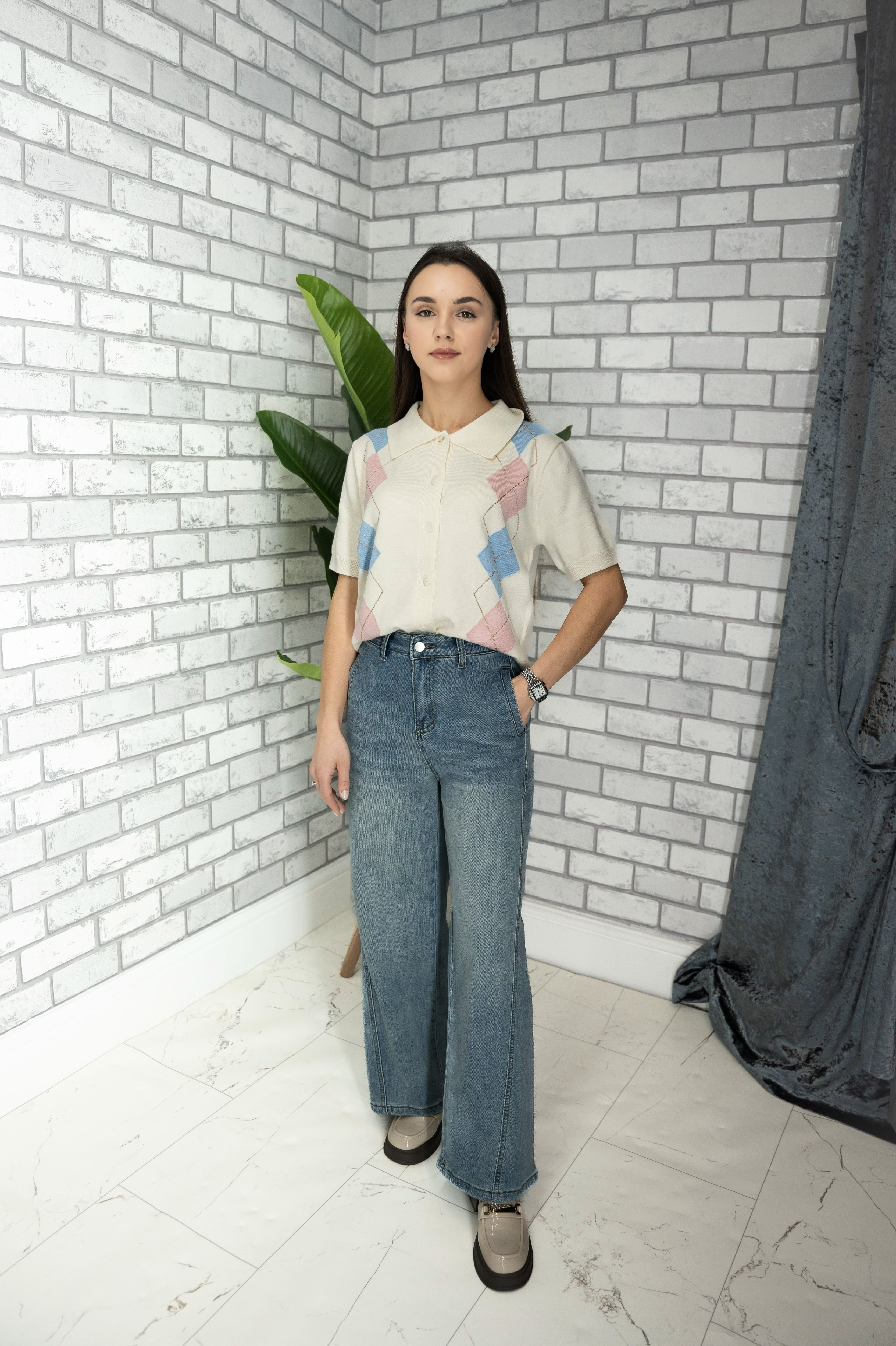 Knitted polo with argyle pattern