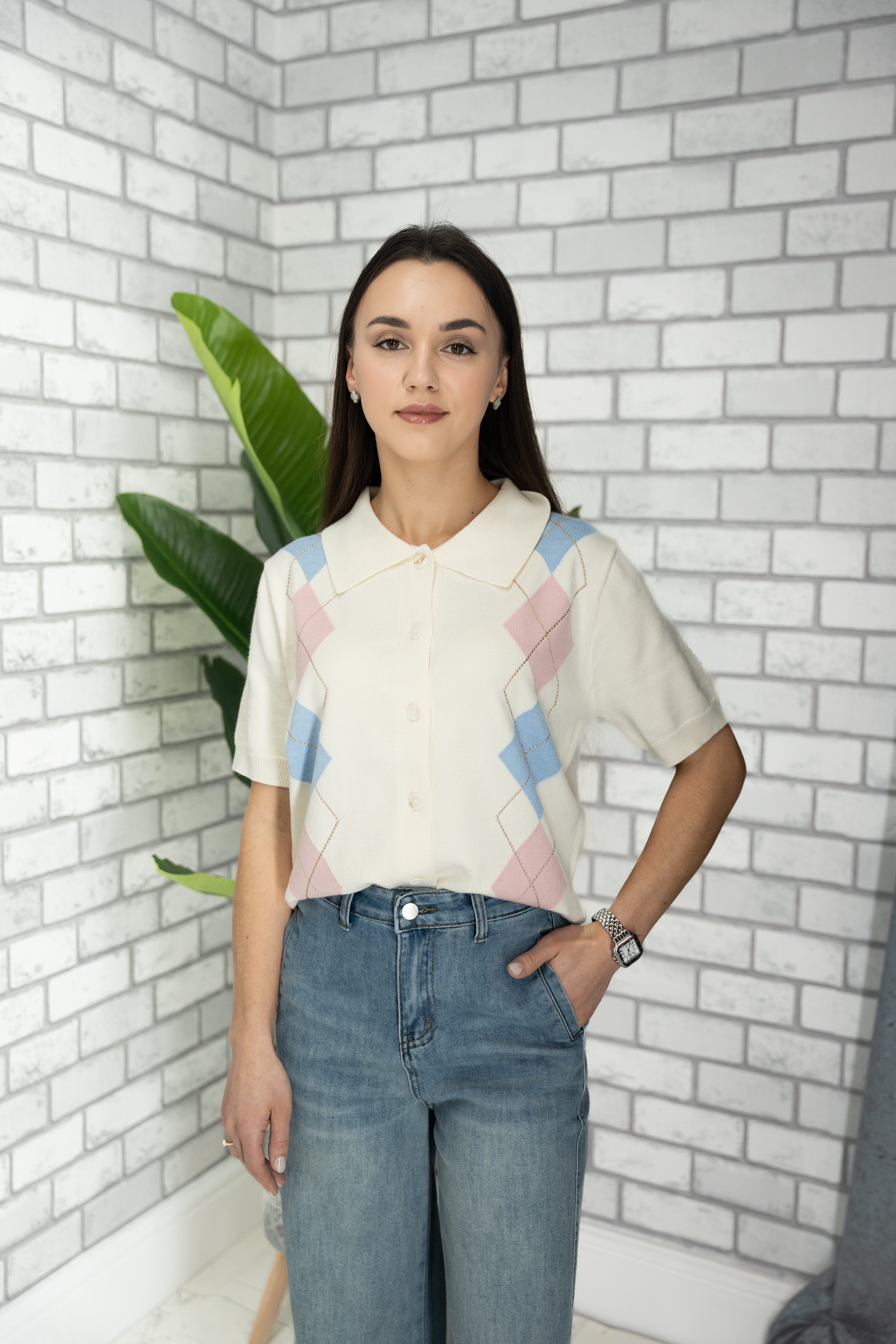 Knitted polo with argyle pattern